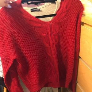 Red, chunky off the shoulder sweater